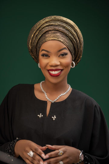 Round rich wife turban gold